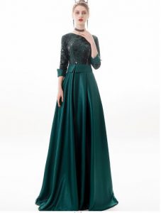 ชุดราตรียาวออกงานกลางคืน ระบายยาว สีเขียว มีแขน